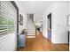 Bright foyer features hardwood floors, stairs to the second level and entry to other living spaces at 1676 Carroll Nw Dr, Atlanta, GA 30318