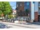The Whelan restaurant exterior with inviting outdoor seating and shade umbrellas at 1676 Carroll Nw Dr, Atlanta, GA 30318