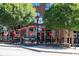 Exterior shot of the restaurant featuring outdoor seating and colorful decor at 1676 Carroll Nw Dr, Atlanta, GA 30318