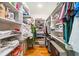 Walk-in closet with storage shelves at 1676 Carroll Nw Dr, Atlanta, GA 30318
