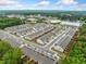 An aerial view of a townhouse community surrounded by trees at 2142 Arnage Dr, Lithonia, GA 30058