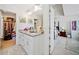 A luxury bathroom features granite counter tops with double sinks and access to a closet at 2142 Arnage Dr, Lithonia, GA 30058