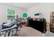 Bedroom featuring a keyboard, speakers, and other equipment, bathed in natural light at 2142 Arnage Dr, Lithonia, GA 30058