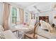Cozy dining area with natural light, elegant curtains, and seating for four at 2142 Arnage Dr, Lithonia, GA 30058