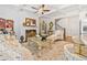 Elegant living room with fireplace, beamed ceilings, and stylish furnishings at 2142 Arnage Dr, Lithonia, GA 30058