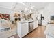 Open concept living space with modern kitchen and elegant living room at 2142 Arnage Dr, Lithonia, GA 30058