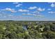 Expansive aerial view of the property with lush greenery, a river, and a picturesque skyline at 222 12Th Ne St # 1806, Atlanta, GA 30309