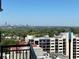 Scenic view from the property, showcasing the surrounding greenery and the distant cityscape skyline at 222 12Th Ne St # 1806, Atlanta, GA 30309