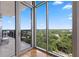 Balcony with black railing and a wooded view at 222 12Th Ne St # 1806, Atlanta, GA 30309