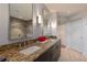 Modern bathroom features double sinks with granite countertops, and a walk-in shower with decorative lights at 222 12Th Ne St # 1806, Atlanta, GA 30309