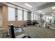 Community fitness center with floor to ceiling mirrors and equipment for a total body workout at 222 12Th Ne St # 1806, Atlanta, GA 30309