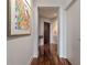 Inviting hallway featuring hardwood floors, modern lighting, and stylish wall art at 222 12Th Ne St # 1806, Atlanta, GA 30309