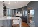 Kitchen featuring gray cabinetry, modern pendant lighting, and a wine refrigerator at 222 12Th Ne St # 1806, Atlanta, GA 30309