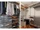 Spacious walk-in closet with custom shelving and storage solutions at 222 12Th Ne St # 1806, Atlanta, GA 30309