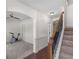 Bright foyer featuring wood floors, staircase, and access to other rooms in the house at 427 Oscar Ct, Mcdonough, GA 30252