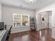Bright office space with hardwood floors, natural light, and white trim at 427 Oscar Ct, Mcdonough, GA 30252