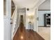 Inviting entryway with hardwood floors, staircase, and views into the living spaces at 4754 Kelley Se Ct, Mableton, GA 30126