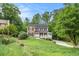 Beautiful two-story home with stone accents, a welcoming front porch, and well-maintained landscaping at 4754 Kelley Se Ct, Mableton, GA 30126