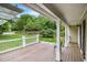 Inviting porch features ample seating and views of the surrounding landscape, perfect for relaxing outdoors at 4754 Kelley Se Ct, Mableton, GA 30126