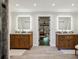Bright bathroom with double sinks, lots of counterspace, modern tile floors and modern wood cabinets at 1050 Mountain Creek Trl, Atlanta, GA 30328