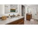 Bright bathroom with double sinks, lots of counterspace, modern tile floors and modern wood cabinets at 1050 Mountain Creek Trl, Atlanta, GA 30328