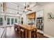 Bright kitchen with stainless steel appliances, double ovens, large island and light cabinets at 1050 Mountain Creek Trl, Atlanta, GA 30328