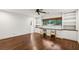 Office with built-in desks and shelving, a ceiling fan and natural light from large window at 1050 Mountain Creek Trl, Atlanta, GA 30328