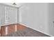 Bright entryway with hardwood floors, side-light windows and neutral walls at 110 Village Green Cir, Tyrone, GA 30290