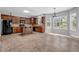 Spacious kitchen with ample cabinetry, granite countertops and bright natural light at 110 Village Green Cir, Tyrone, GA 30290