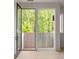 Balcony with an attached door with view of the surrounding trees at 11548 Serenbe Ln, Chattahoochee Hills, GA 30268
