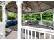 Gazebo with weathered wood and a ceiling fan overlooking the lush backyard at 1510 Pecan Plantation Ct, Loganville, GA 30052