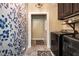 Convenient laundry room featuring modern washer and dryer, ample cabinetry, and decorative accents at 1510 Pecan Plantation Ct, Loganville, GA 30052