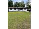 Charming home with a well-manicured lawn and updated exterior paint at 4074 Green Hawk Trl, Decatur, GA 30035