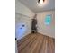 A utility room with water heater, wood-look floors and shelving at 4074 Green Hawk Trl, Decatur, GA 30035