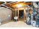 Unfinished basement area with a water heater, utility sink, and ample storage space at 4344 White Surrey Nw Dr, Kennesaw, GA 30144
