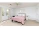 A comfortable bedroom features a plush carpet and a ceiling fan at 4344 White Surrey Nw Dr, Kennesaw, GA 30144