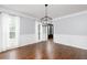 Elegant dining room with stylish lighting and hardwood floors at 4344 White Surrey Nw Dr, Kennesaw, GA 30144