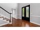 Spacious entry foyer with hardwood floors and staircase at 4344 White Surrey Nw Dr, Kennesaw, GA 30144