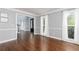 Bright living room with hardwood floors and large windows at 4344 White Surrey Nw Dr, Kennesaw, GA 30144