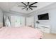 An airy main bedroom offers a light color palette and an ensuite bathroom at 4344 White Surrey Nw Dr, Kennesaw, GA 30144