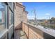Balcony featuring brick siding with views of the city skyline and tree-lined streets at 1199 Huff Nw Rd # 112, Atlanta, GA 30318