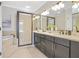 Elegant bathroom showcasing a large soaking tub and spacious shower with stone tile surround at 1199 Huff Nw Rd # 112, Atlanta, GA 30318