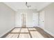 Bright bedroom featuring hardwood floors and multiple entryways at 1199 Huff Nw Rd # 112, Atlanta, GA 30318