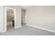 Spacious bedroom showing entry to a bathroom and a glimpse into a walk-in closet at 1199 Huff Nw Rd # 112, Atlanta, GA 30318