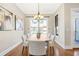 Bright dining room features modern decor, hardwood floors, and natural light at 1199 Huff Nw Rd # 112, Atlanta, GA 30318
