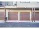 Two car garages, with individual unit numbers, offering safe parking and additional storage space at 1199 Huff Nw Rd # 112, Atlanta, GA 30318