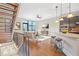 Open concept living space featuring high ceilings, modern finishes, and an abundance of natural light at 1199 Huff Nw Rd # 112, Atlanta, GA 30318