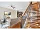 Bright living room space offering hardwood floors, modern lighting and an open concept kitchen at 1199 Huff Nw Rd # 112, Atlanta, GA 30318