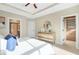 Well-lit main bedroom offering double door access to the walk-in closet and bathroom at 1199 Huff Nw Rd # 112, Atlanta, GA 30318