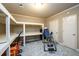 This bedroom features custom built-in shelves and ample storage space with doors at 1430 Hampton Hill Dr, Alpharetta, GA 30022